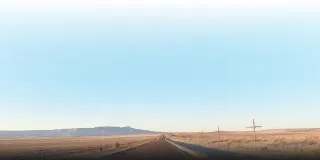 road fading off into mountains