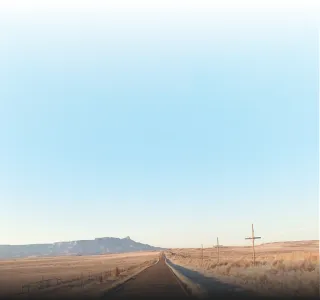 road fading off into mountains