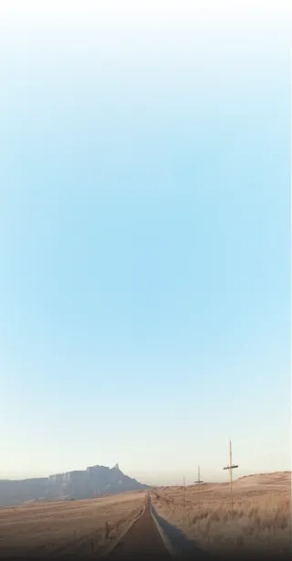 road fading off into mountains