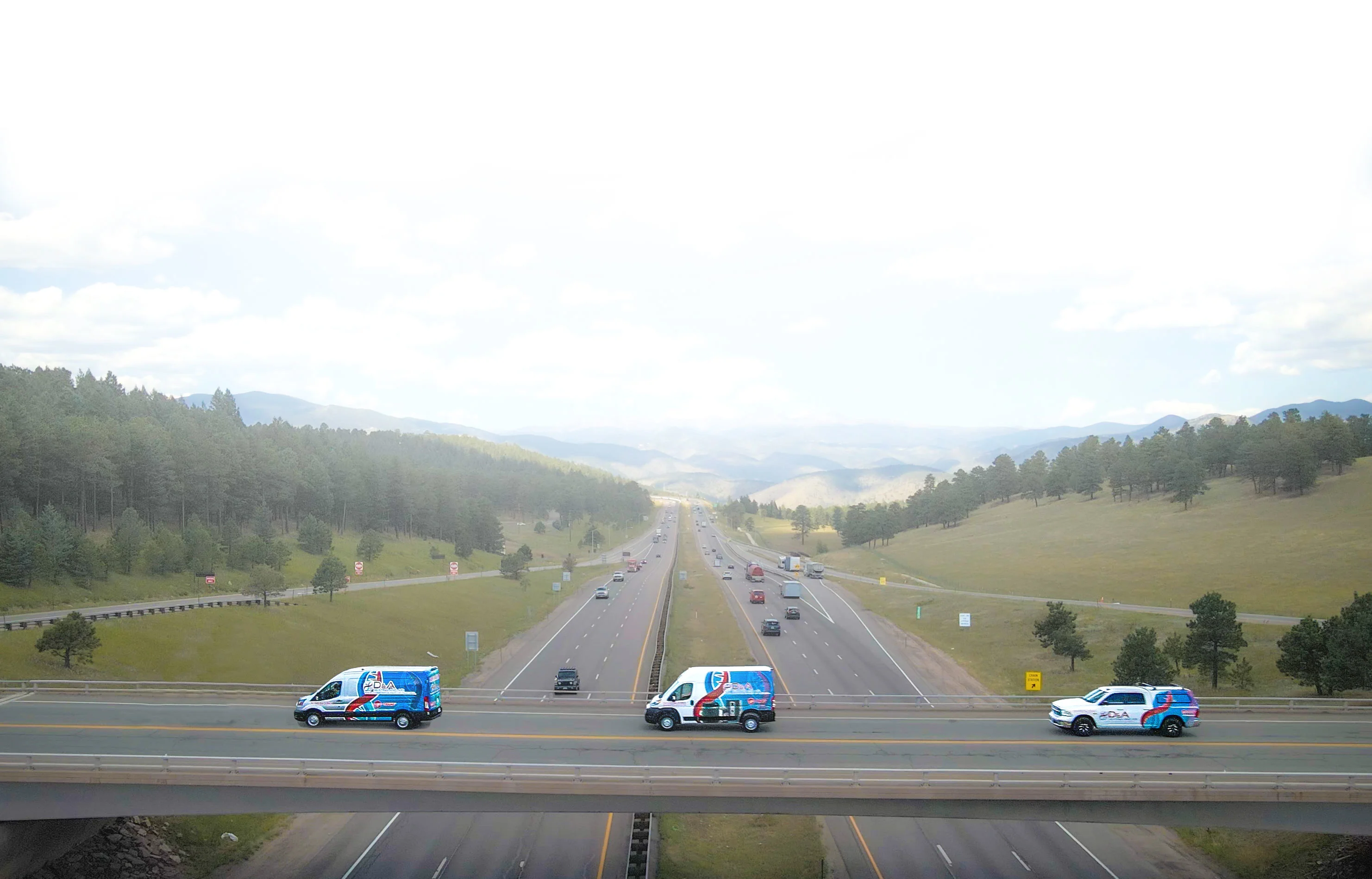 Wrapmate service vehicles on the highway